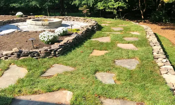 Freshly installed residential sod and grading for a weed-free backyard