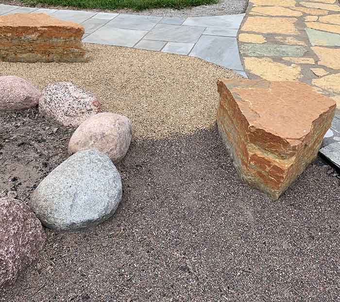 landscaping stone seat around firepit